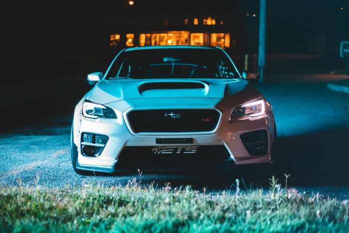 white luxury car with shiny indicators